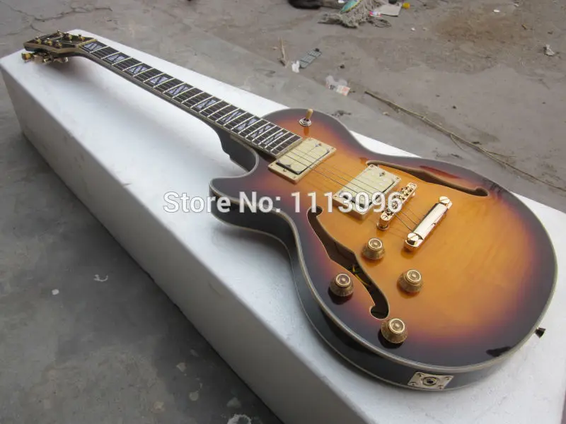 

FREE SHIPPING+LP CUSTOM+OEM brand left hand electric GUITAR+maple flame top+GUITAR IN CHINA