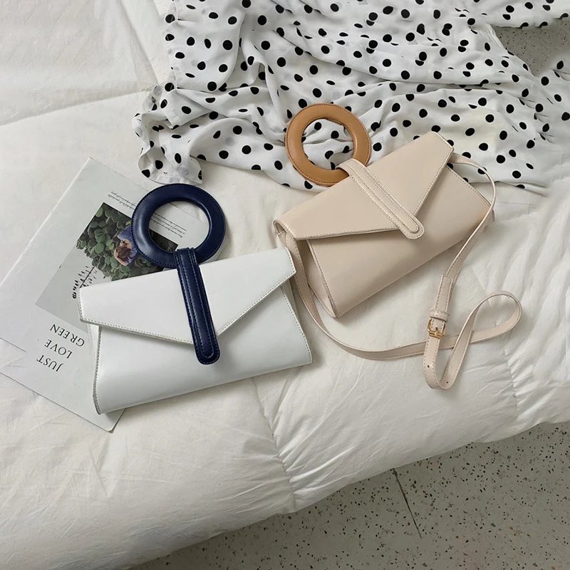حلقة حقائب النساء الكورية جديد مغلف أنيق حقيبة السيدات الأعلى مقبض حقيبة صغيرة بسيطة حقيبة كتف نسائية ملص دي سنهورا