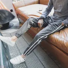 Г. Новая мужская Осенняя мода цвет букв сбоку в полоску повседневные свободные штаны эластичные Штаны Большие размеры хип-хоп певица костюмы