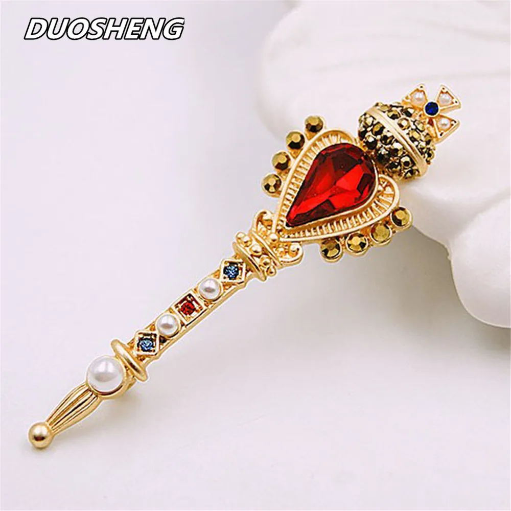 

Fashion magic wand inlaid with a semi-precious stone cross female Imitation pearl brooch 2019 needle accessories wholesale