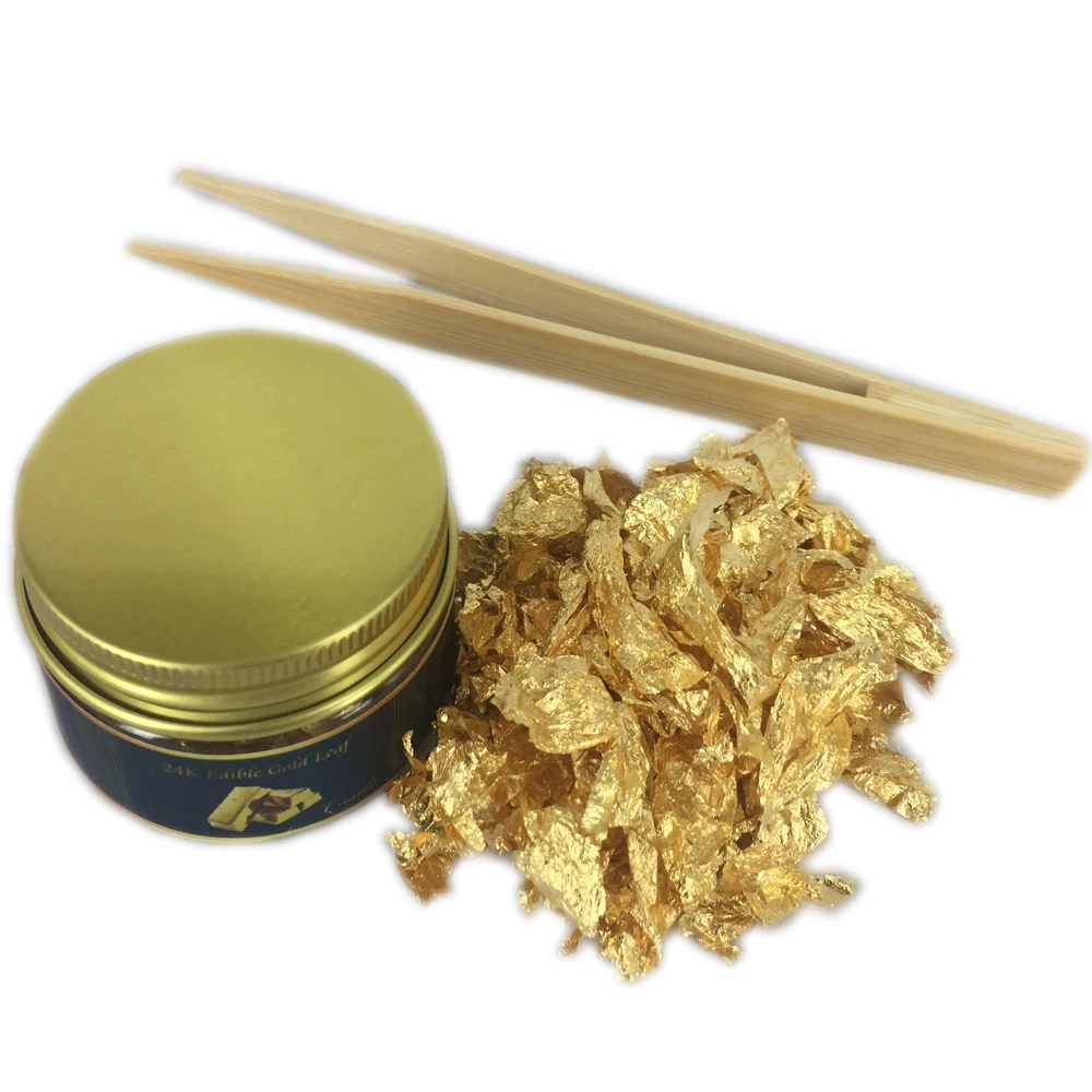 

About 0.1 Gram of each Edible gold and sivler flake leaf and Bamboo clip for decorate Chocolate and cake Arts food decoration