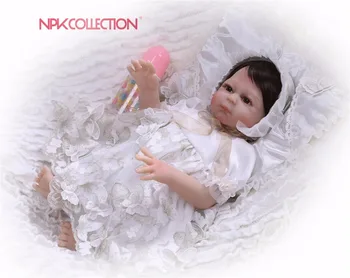 

NPK new hot 19inches cotton body lifelike alive baby girl with short pasted hair and lovely clothes Silicone Reborn baby dolls