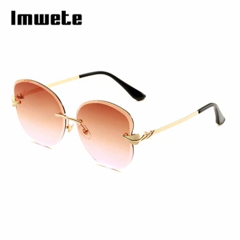 

Imwete Women Cat eyes rimless sun glasses Big lens Brand design frameless metal legs Femal outdoor sunglasses UV protection