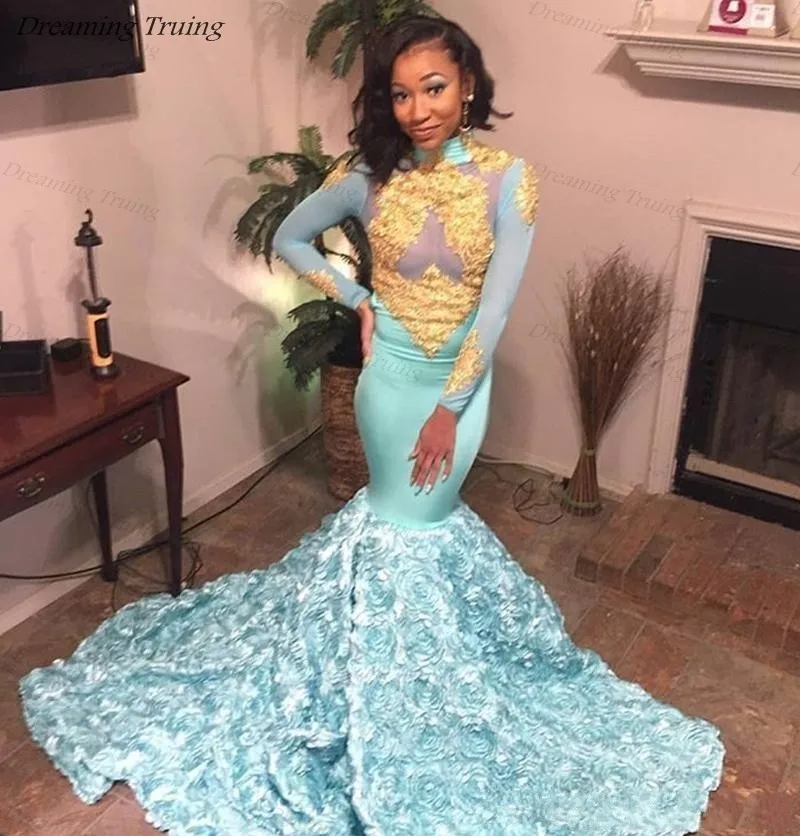 mermaid prom dress with roses at the bottom