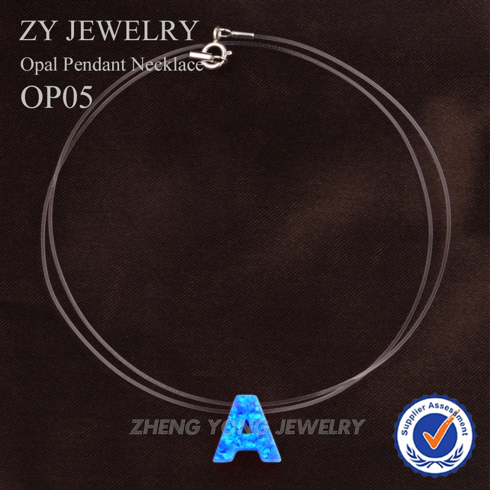 

Hot Sale Synthetic OP05 Blue Letter A Opal Pendant Necklace with Transparent Nylon Chain