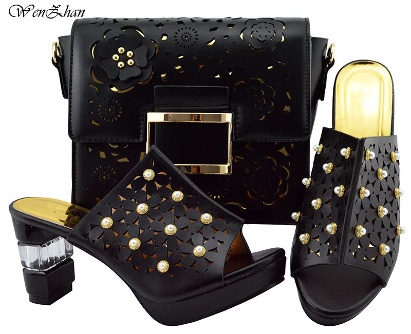 black and cream shoes with matching bag