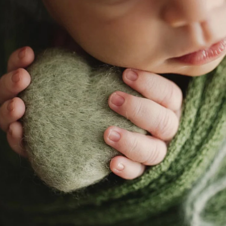 newborn photography heart-shaped