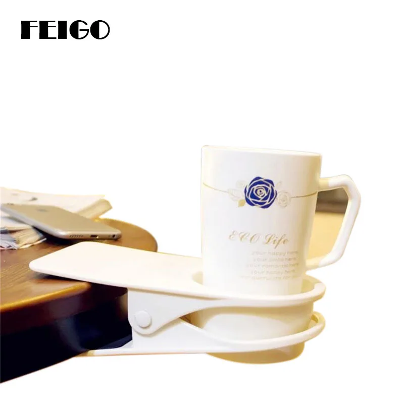 

FEIGO 1Pcs New Coaster Desk Cup Holder Clip ABS Cupholder Plastic Office Drinks Beverages Creative Home Table Storage Rack F297