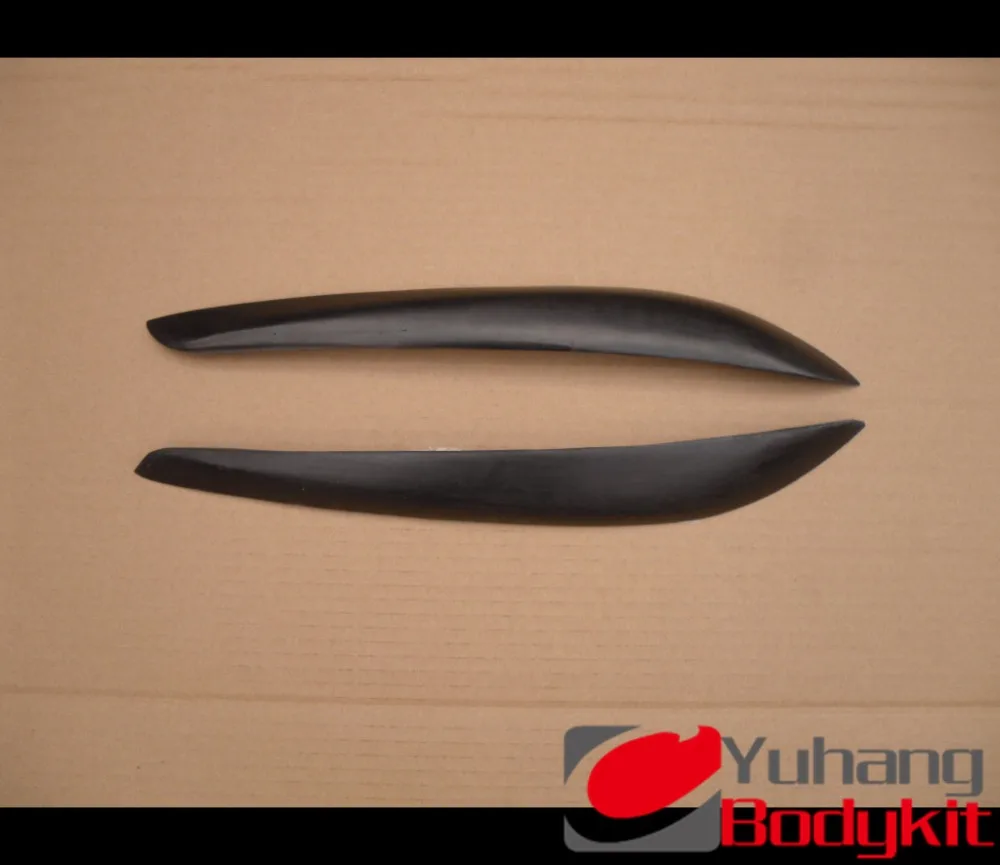 

Skyline R34 Glass Fiber CAR HEADLIGHT EYE LIDS (pair) FRP