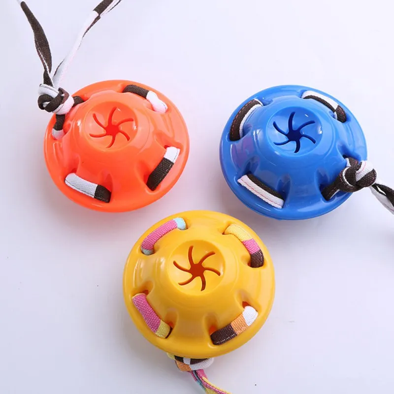 الكلب التدريب اللعب الملونة الشريط تحلق القرص شكل تسرب المواد الغذائية الكرة ، التدريب TPR المطاط رمي لعبة