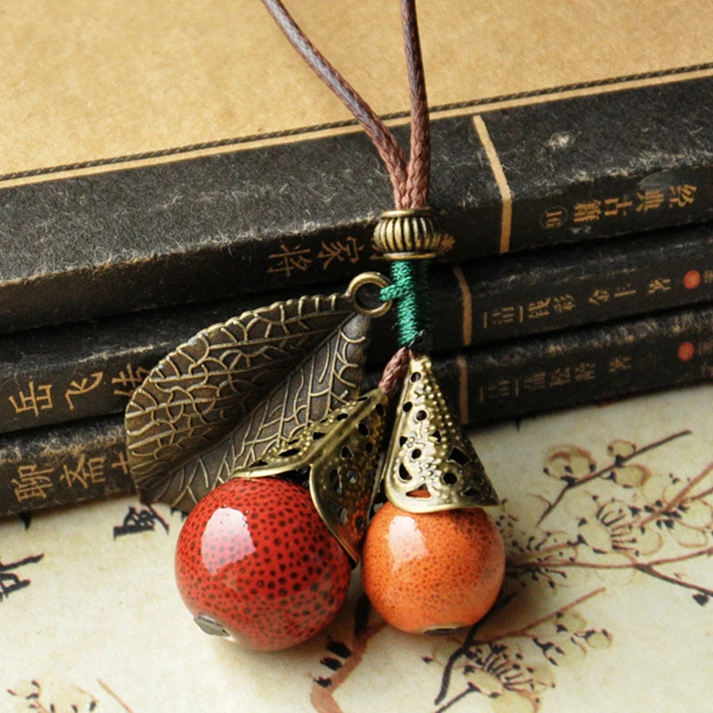 

Fashion Sweater Necklace Jewelry Round Ball Leaf Long Ceramic Necklace Women Exquisite Pendant Accessories Pendants Gifts 8C1543