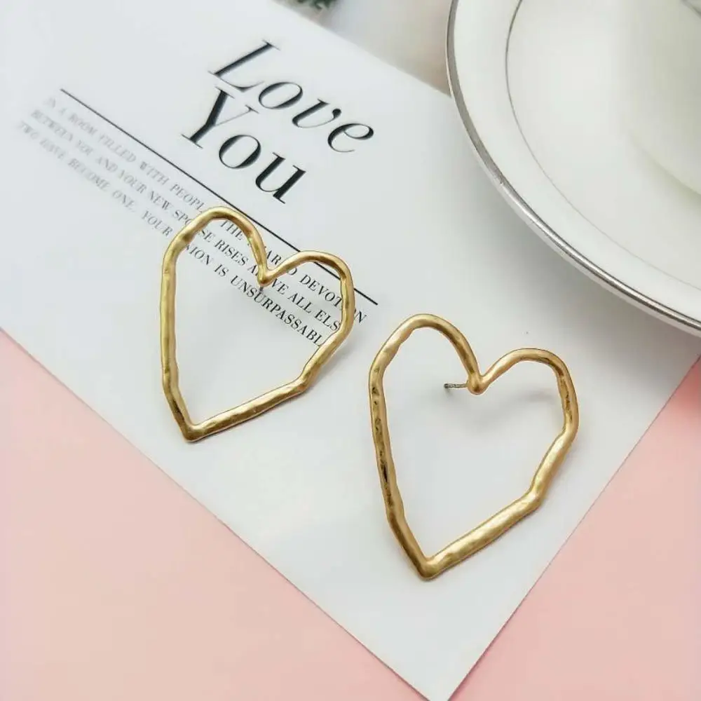 

TRENDY WOMEN EARRINGS MATT GOLD COLOR PLATING GOOD QUALITY HEART SHAPED STUD EARRINGS