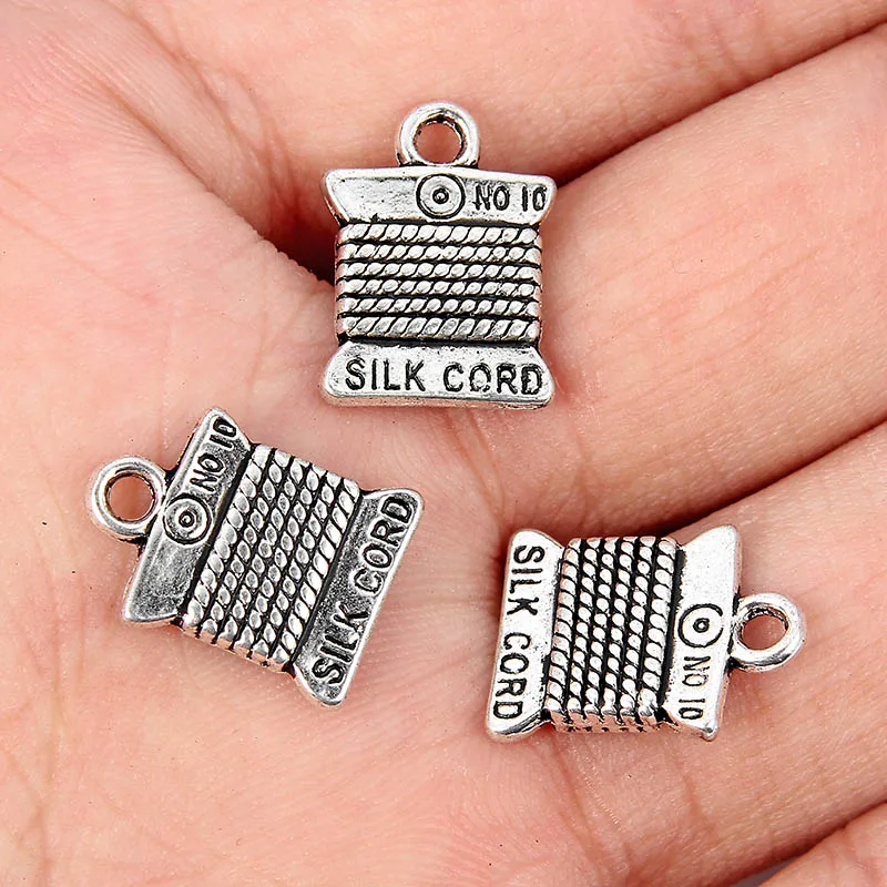 

10pcs vintage metal tibetan silver cotton reel sewing thread charms pendants fit bracelet jewelry findings making necklace