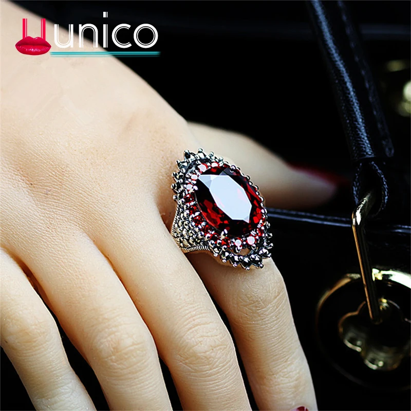 

UUNICO Best selling silver ring jewelry retro Thai silver big ring red pomegranate jewelry exaggerated black mine ring.