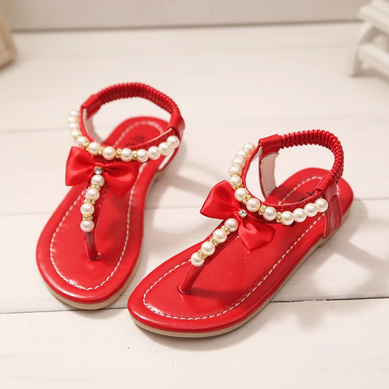 girls red flip flops