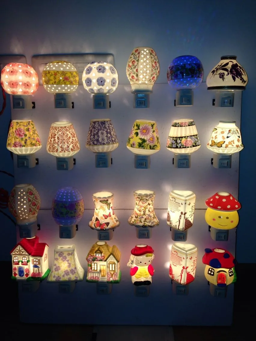 Fashion ceramic small night light aromatherapy lamp ofhead plug in