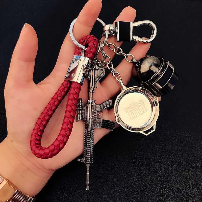 Alta calidad PUBG armas Mini modelo Metal llaveros mochila Pan juguete del coche hombres colgante llaveros titular baratijas llavero