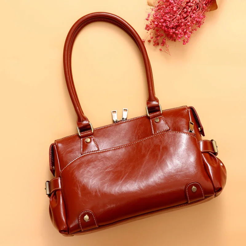 

Women's bag factory 2019 new style European and American fashion leather, hand shoulder , women's hand, satchel.