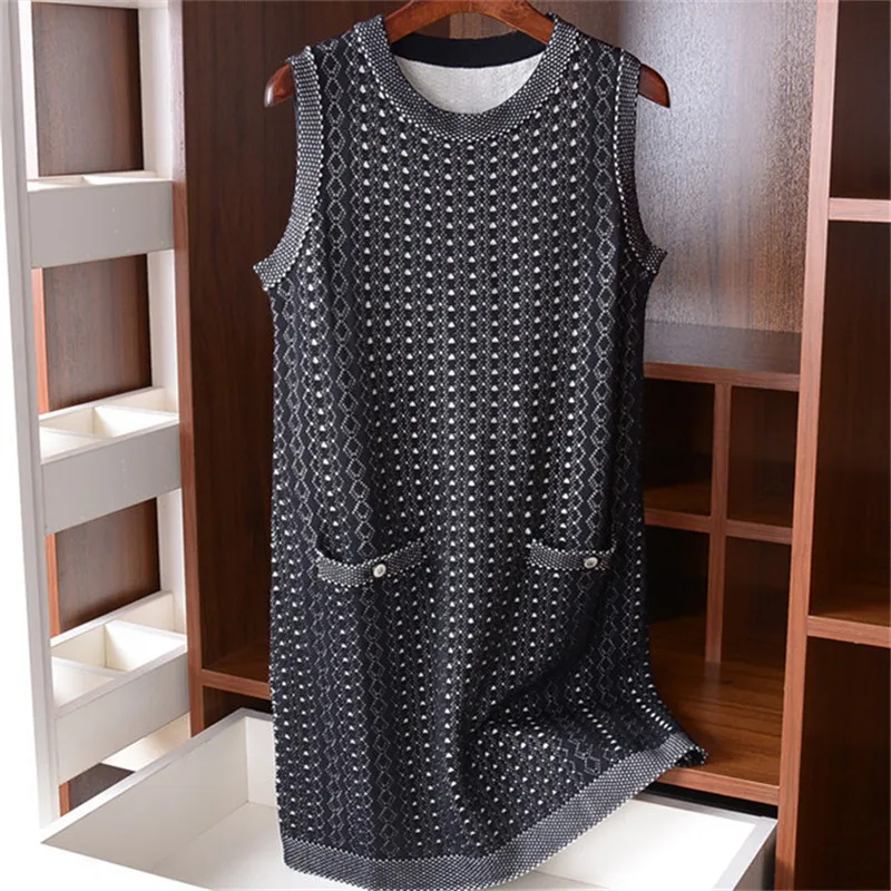 Wol polyester blend Oneck gebreide vrouwen mode dot mouwloze lange pockets trui S-L retail groothandel Wol polyester blend Oneck gebreide vrouwen mode dot mouwloze lange pockets trui S-L retail groothandel