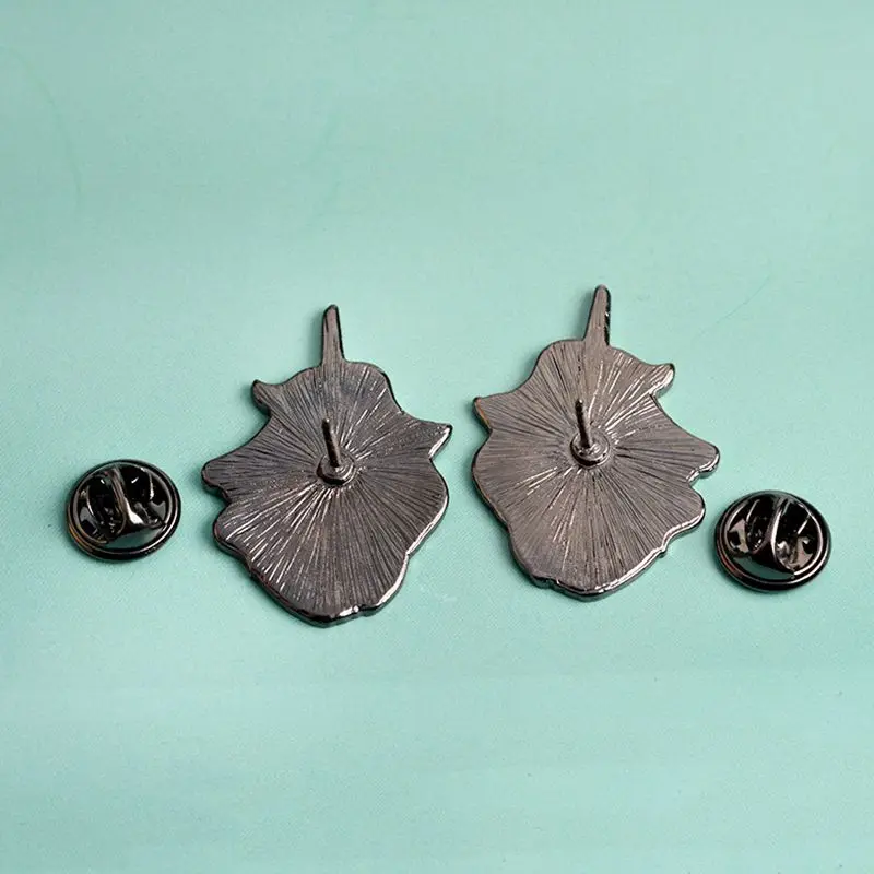 badge brooch
