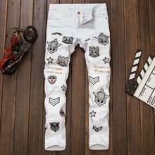 Hot 2017 New fashion white men jeans ripped biker pants, European and American Bar DJ style jeans male Badge Zipper trouser