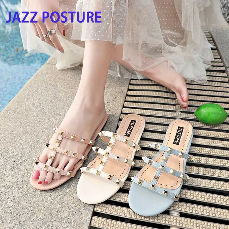 

2019 women's slippers summer beach casual shoes women's flat shoes Roman shoes rivets female slippers outdoor leisure hot y320