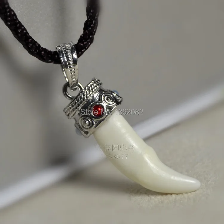 dog tooth pendant