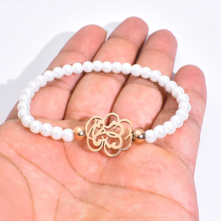 

Hot sale Stainless Hollow Design Animal Hollow Flower Plant Shape Lucky Pearls Bracelets Women Girls Lovers Pulsears osos