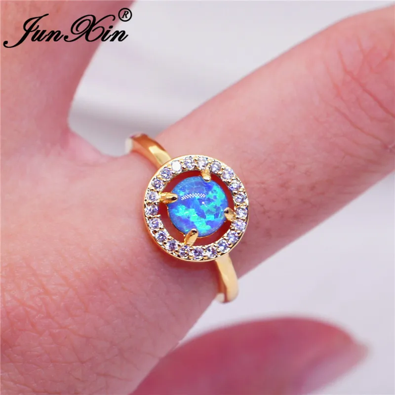 JUNXIN Fashion Pink/Blue Fire Opal Rings For Women Men Rose Gold Filled Round CZ Rainbow Stone Crystal Wedding Rings For Couples