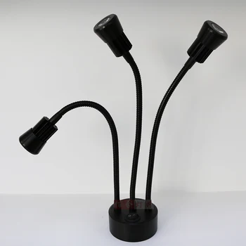 

Charge Lamp Power Supply Exhibition Cabinet Stall With Goods Spread Out On The Ground For Sale Jewellery lo442