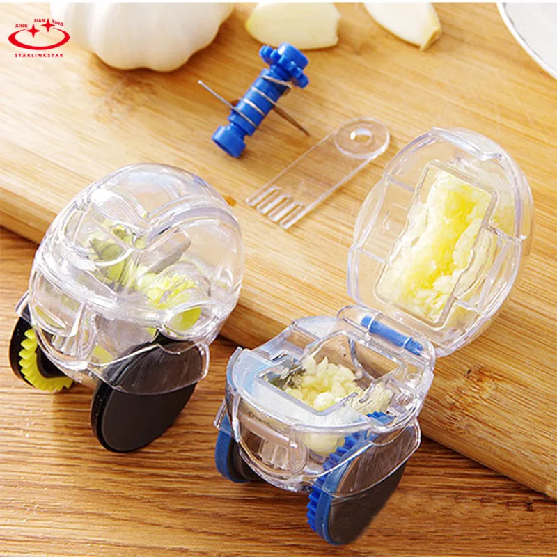 

2018 New Style Wonderful Kitchen Creative Roller Cut Garlic Press Tool Kitchen Household Useful Garlic Dishes Press Tool