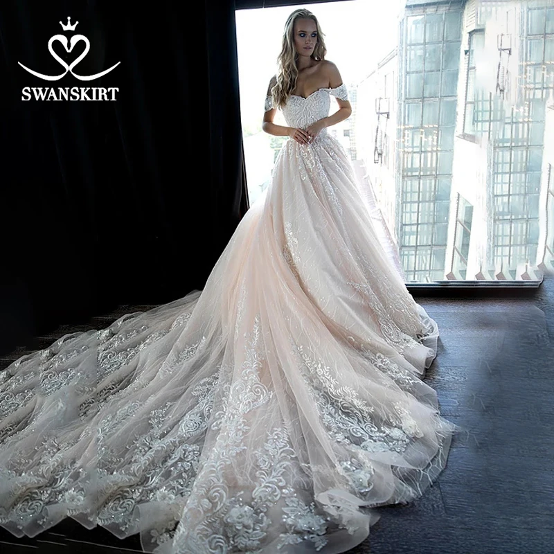 

Swanskirt Fashion Beaded Vestido de novia Wedding Dress 2019 Off the Shoulder Appliques Ball Gown Chapel Train Bridal Gown HZ03