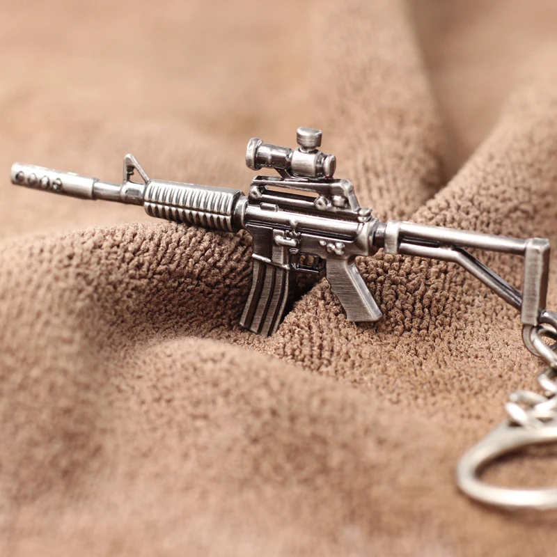 Retro Mini Rifle Revolver M4A1 Gun Key Chain Metal Weapons Men's Key Chain Hot Game Pendant Keyring Jewelry Cool Souvenirs Gifts Retro Mini Rifle Revolver M4A1 Gun Key Chain Metal Weapons Men's Key Chain Hot Game Pendant Keyring Jewelry Cool Souvenirs Gifts
