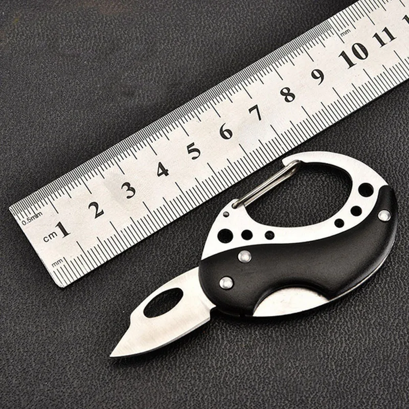

Mini folding knife Camping Sharp Cutter Box Blade Peel Outdoor Knife Pare Cutter Cut Fold Fruit Tool Carabiner Package Survive