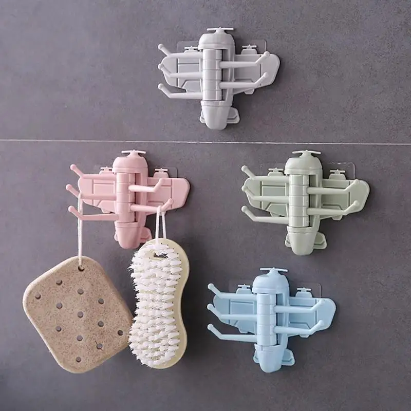 

1PC kitchen bathroom storage rack rotating hook aircraft shape wall-mounted hanger towel hook storage rack direct