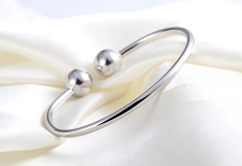 Adjustable sterling silver bangles (2)