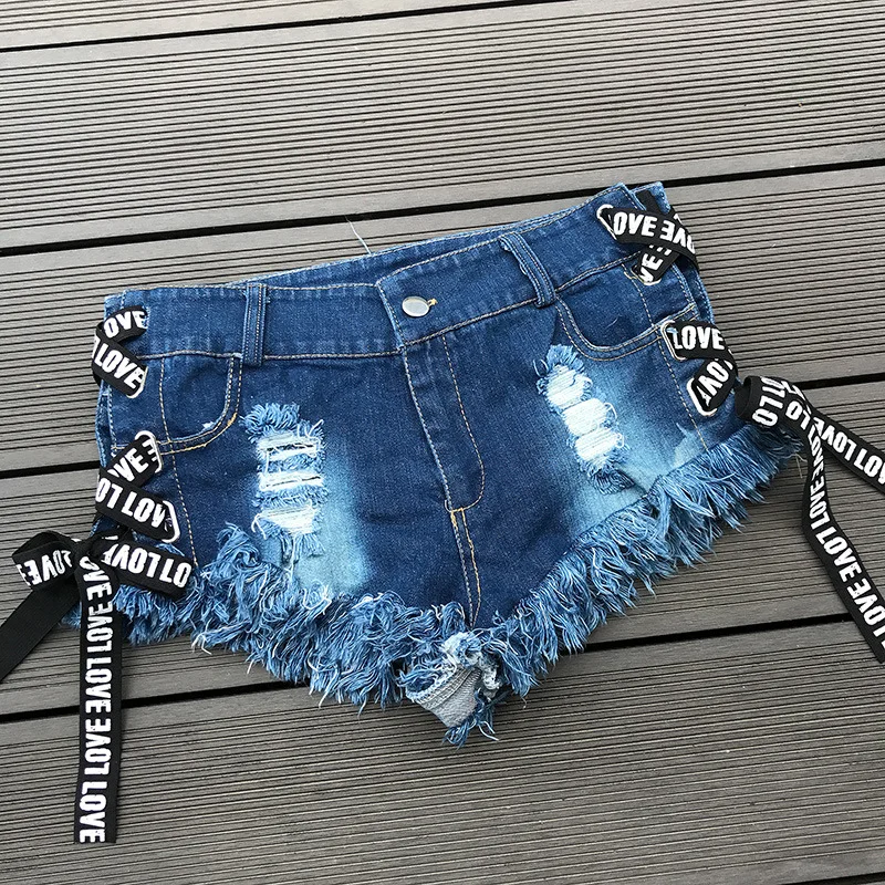 2018 Sexy Low Waist Bandage Denim Ripped Hole Short Jeans Mini Skinny Sexy Club DJ Dance Shorts New White Blue Black 2018 Sexy Low Waist Bandage Denim Ripped Hole Short Jeans Mini Skinny Sexy Club DJ Dance Shorts New White Blue Black