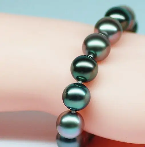 

HUGE7.5-8" TAHITIAN GENUINE BLACK PEACOCK GREEN PEARL BRACELET ROUND AAA