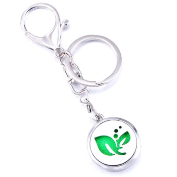

Delicate Leaves Fashion Perfume Aroma Locket Keychain Stainless Steel Aromatherapy Essential Oil Diffuser Box Keyring Jewelry