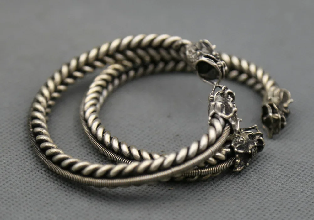 

Old Chinese Miao Silver Handmade Twine Animal Dragon Head Duad Bracelets