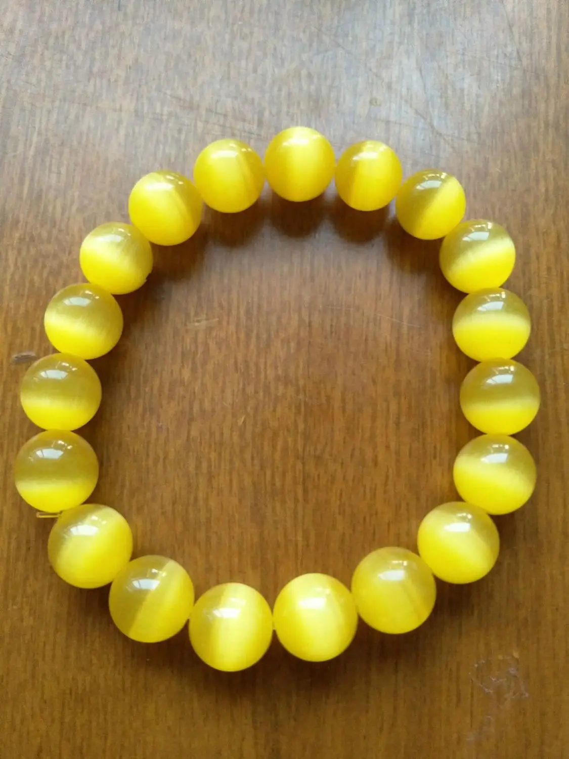 

Fashion beautiful Handmade 10mm yellow Round elastic bracelet 7 ' 0344 28%