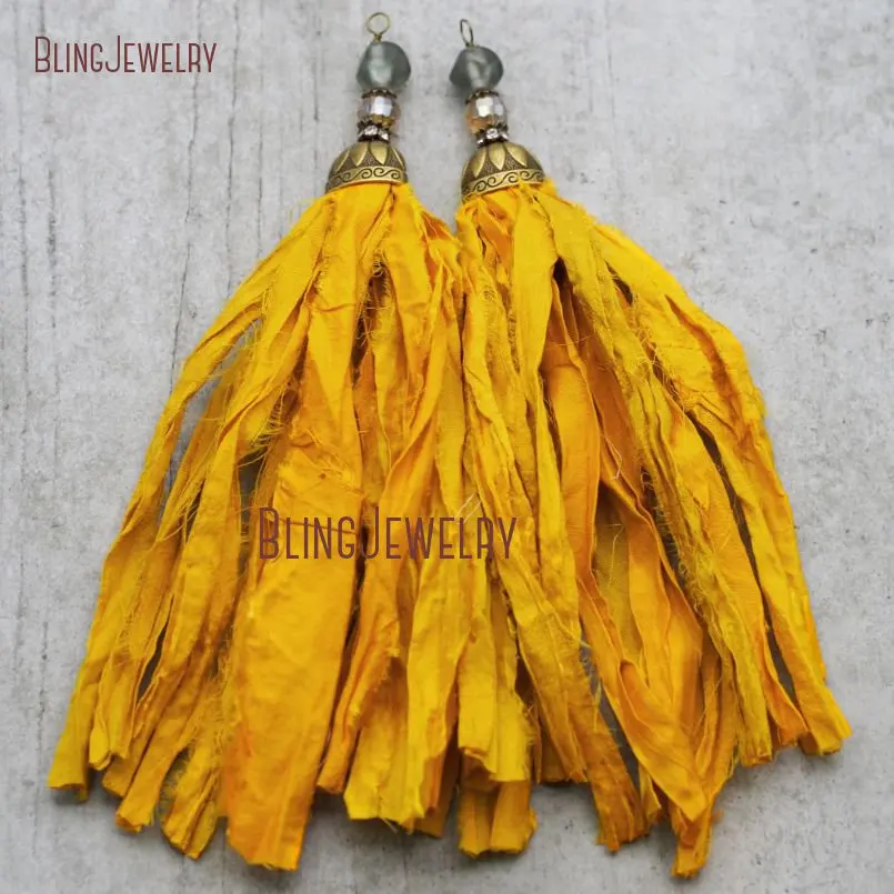 

Golden Yellow Sari Silk Tassel Pendant with Antique Bronze Cap and Matte Crystal Accent PM9053