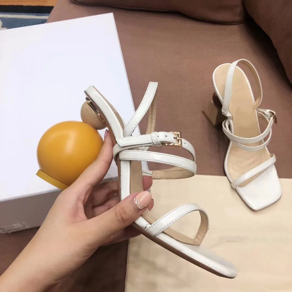 

High heel sandals with heteromorphic and asymmetrical wooden shoes geometric shape of the brand high heel sandals