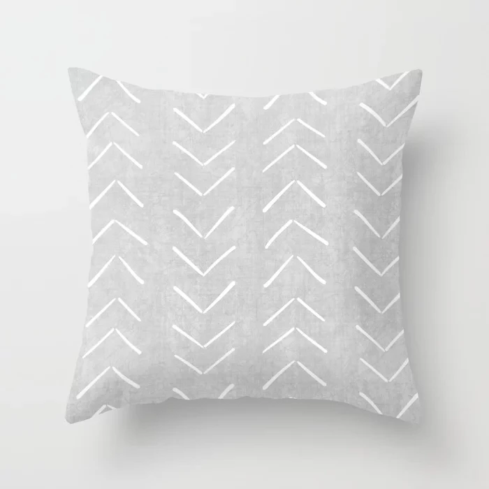 mudcloth-big-arrows-in-grey-pillows.webp