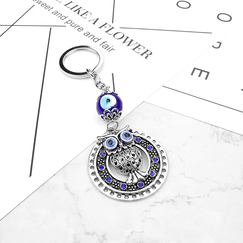 

2017 Fashion Evil eye keychain Cute Owl Crystal Charm Purse Handbag Car Key Keyring Keychain Party Wedding Birthday Gift