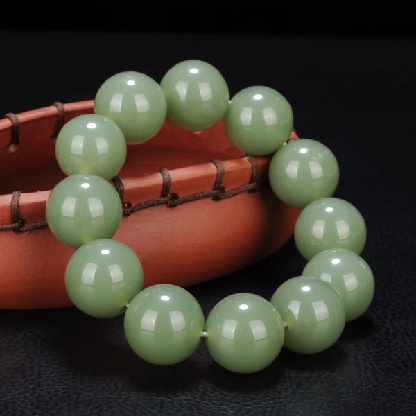

Chinese Hand-carved Natural Hetian Jade Hand-string Blue and White Jade Balls Bracelet