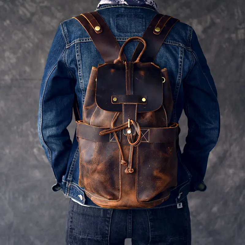 

Large capacity man travel bag mountaineering backpack handmade Oil Genuine Leather drawstring bucket shoulder bag Daypack Male