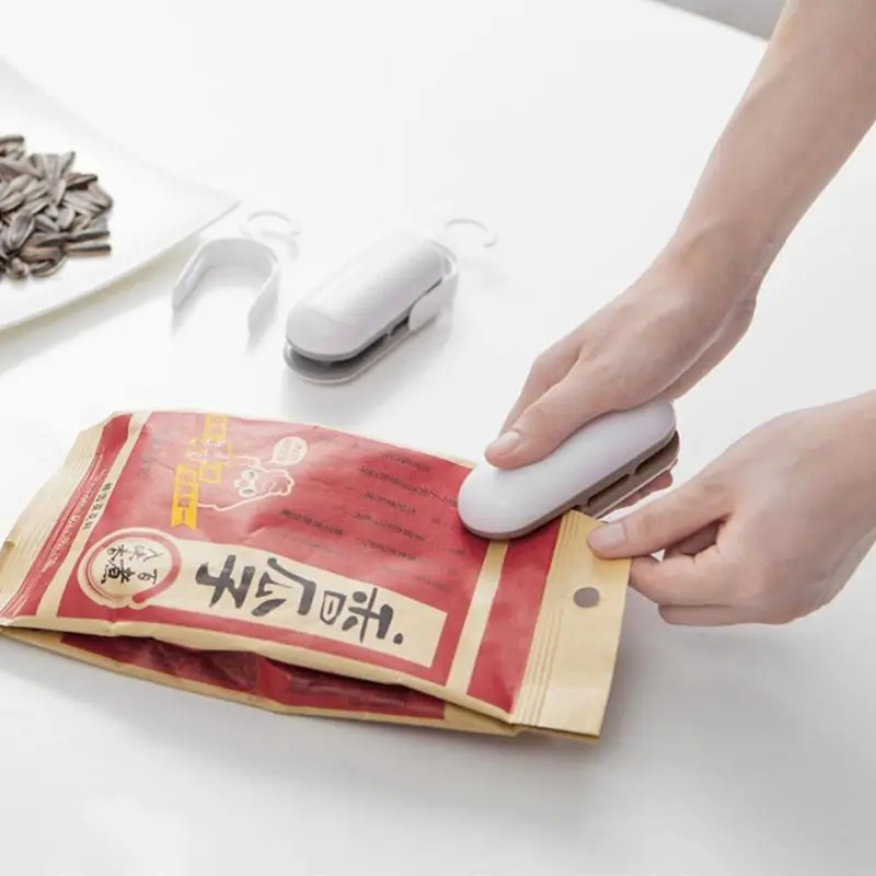 

Mini Potable Manual Handheld Package Sealing Machine For Plastic Snack Bag Handy Household Tool