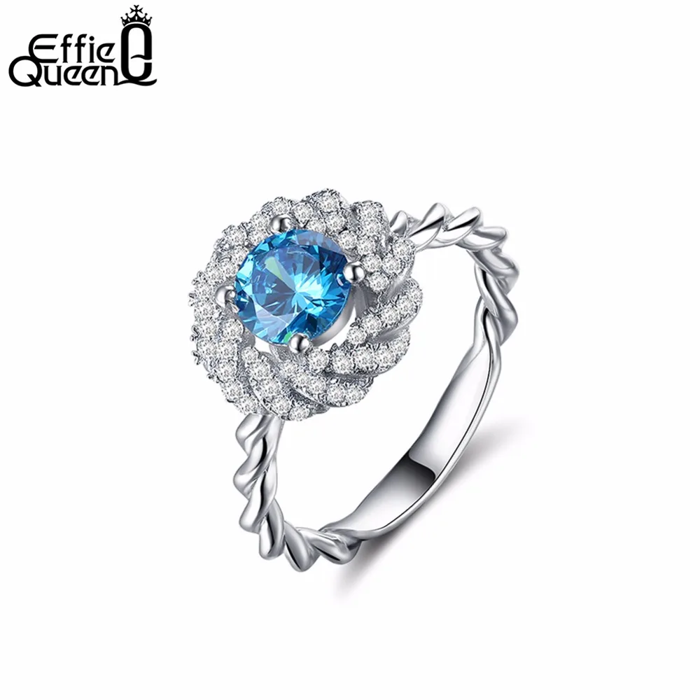 

Effie Queen Hot 2017 Women Silver Color Blue Crystal Love Flower Shaped Ring Bridal Wedding Jewelry Love DOR148