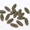 20 PCs Doreen Box Hollow Flower Oval Shape Spacer Beads Bronze Color 23x9mm Vintage DIY Jewelry Making Accessories， Hole: 1.2mm ► Photo 3/3